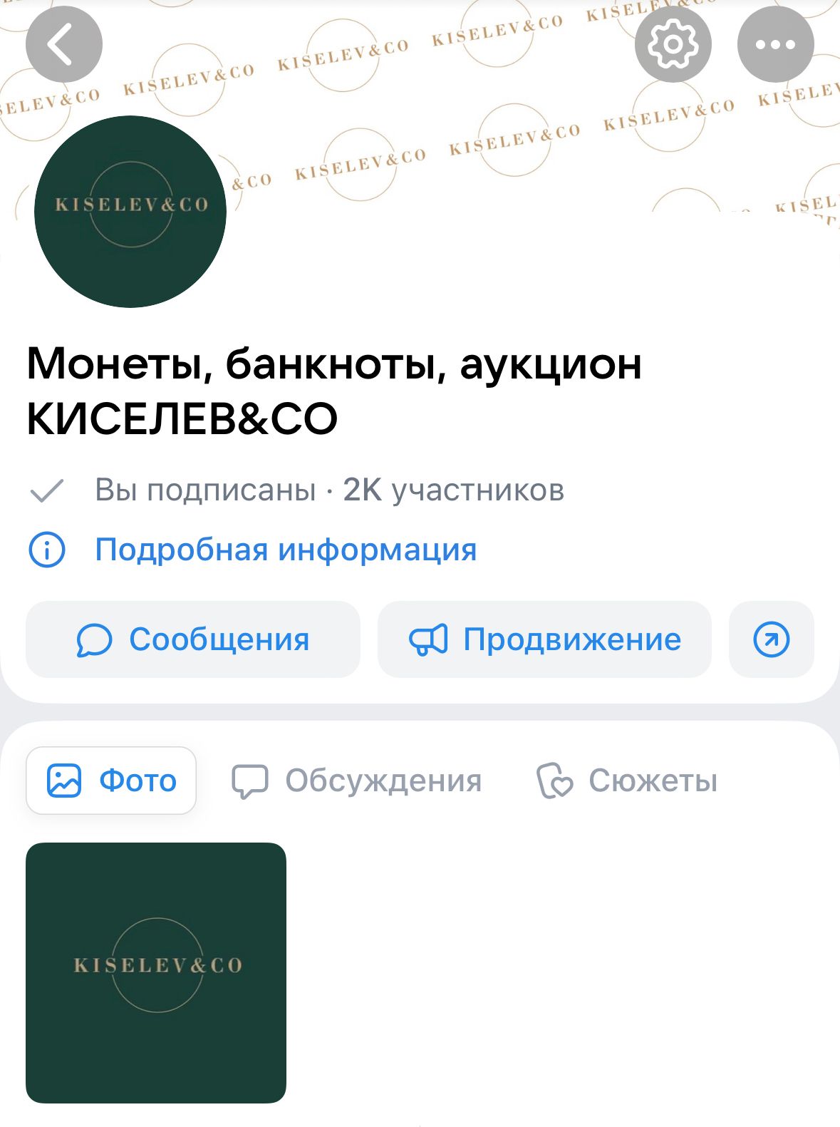 Chris standing up holding his daughter Elva